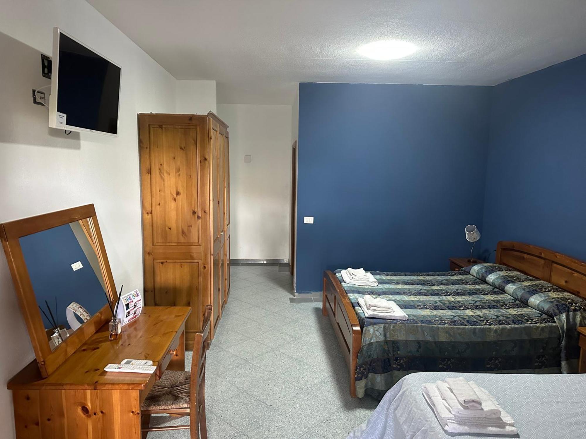 Le Stanze Del Mare Aparthotel Golfo Aranci Exterior photo